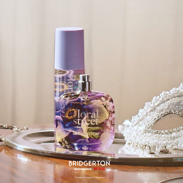 Floral Street Enchanted Masquarade for Bridgerton Eau de Parfum and Perfume Mist on a decorative tray with a neutral background
